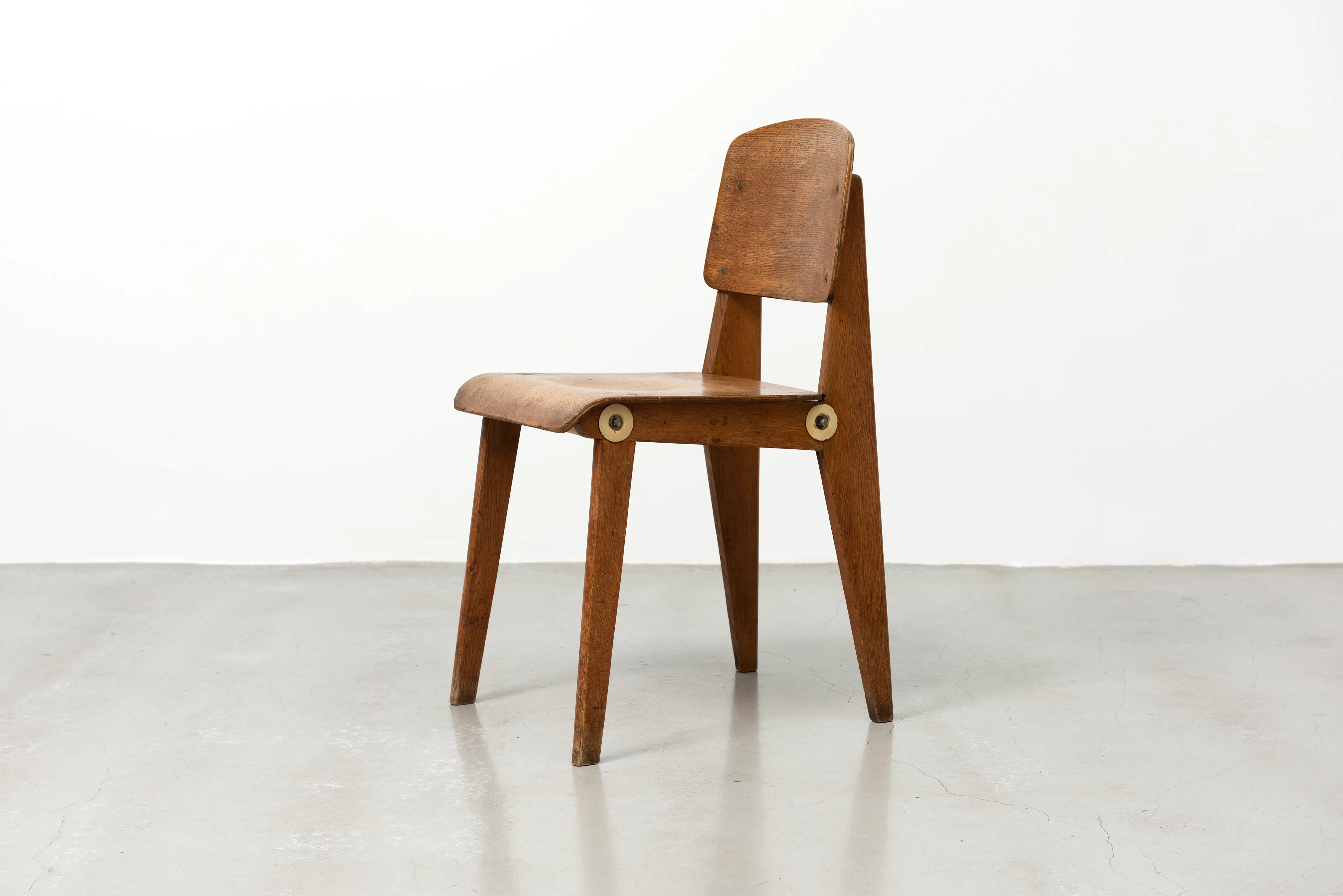 JEAN PROUVÉ - Demountable wooden chair CB 22, ca. 1951 JEAN PROUVÉ - Demountable wooden chair CB 22, ca. 1951 – Solid wood and molded plywood, steel tube