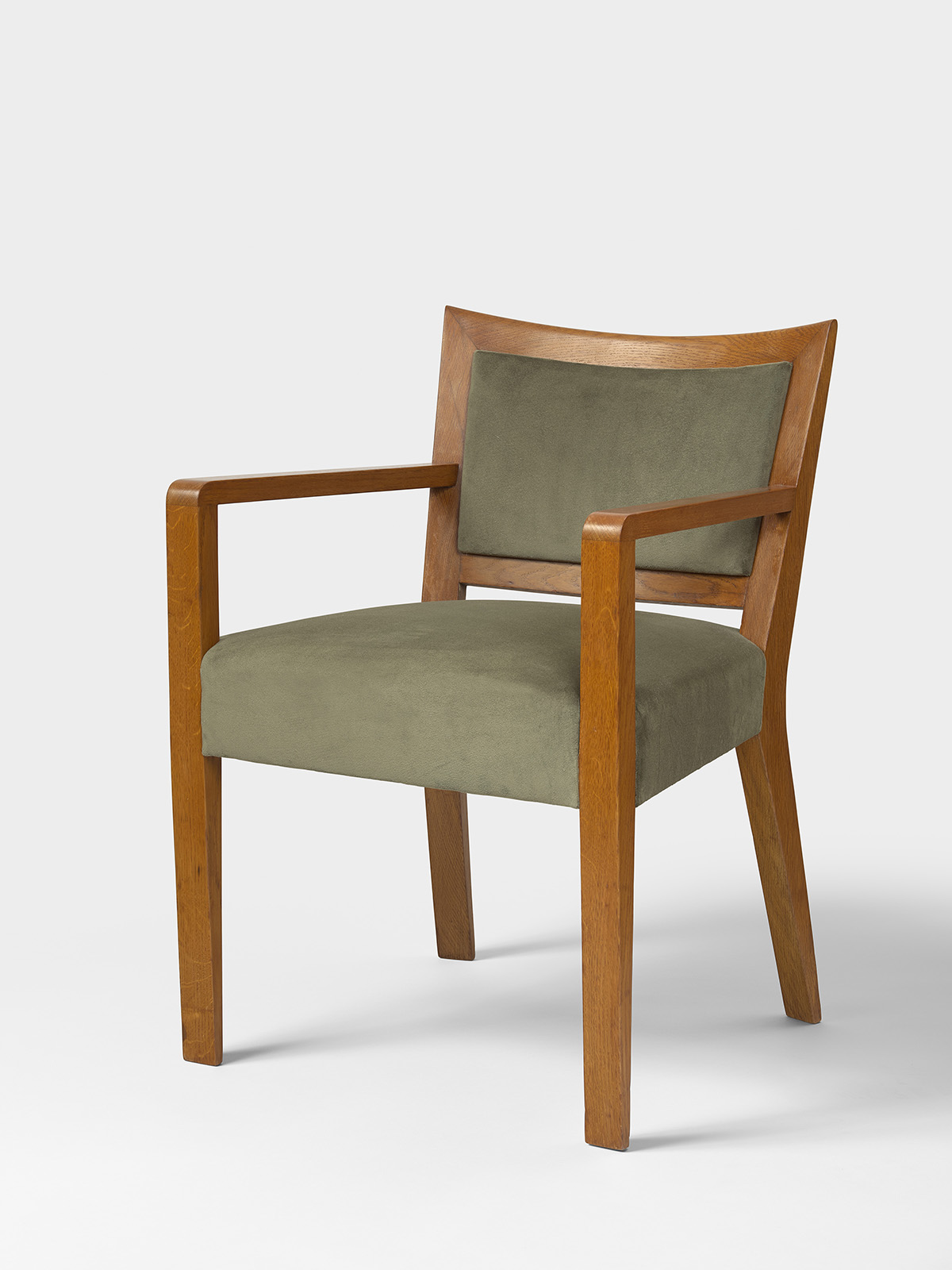 JEAN ROYÈRE - Bridge armchair, ca. 1950 – Oak and velvet