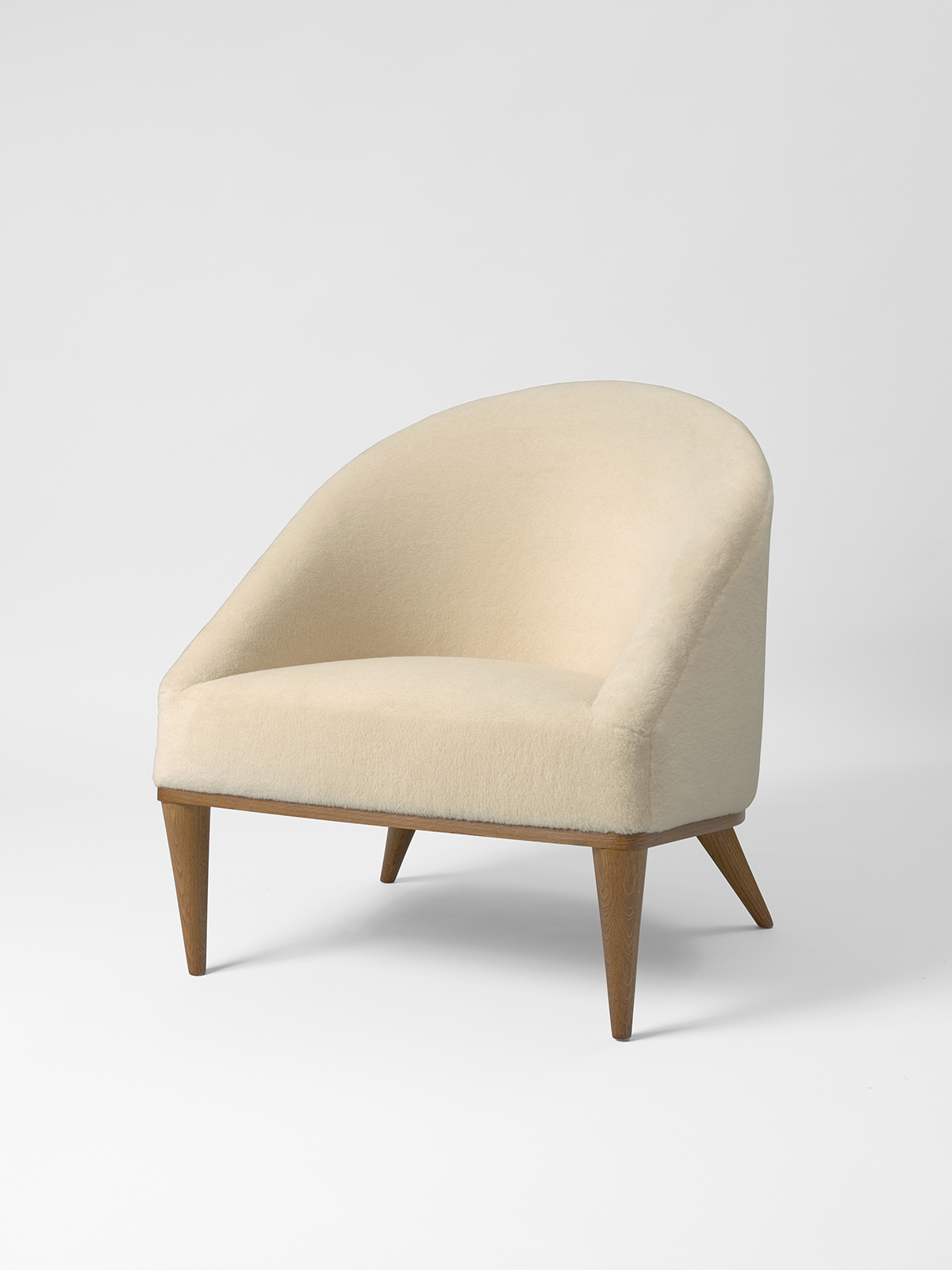 JEAN ROYÈRE - Fauteuil Baquet, ca. 1950 JEAN ROYÈRE - Fauteuil Baquet, ca. 1950 – Chêne et velours de mohair