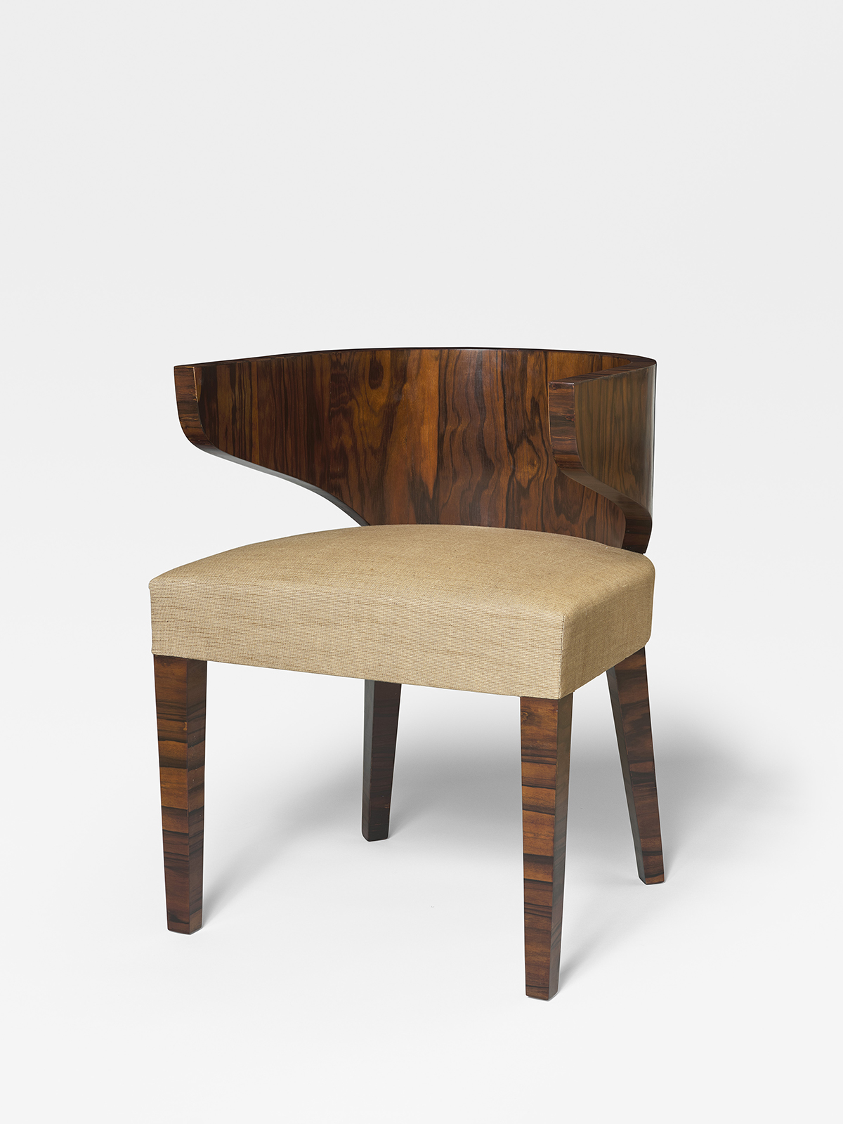 JEAN ROYÈRE - Fauteuil, ca. 1950 JEAN ROYÈRE - Fauteuil, ca. 1950 – Ébène de Macassar et tissu